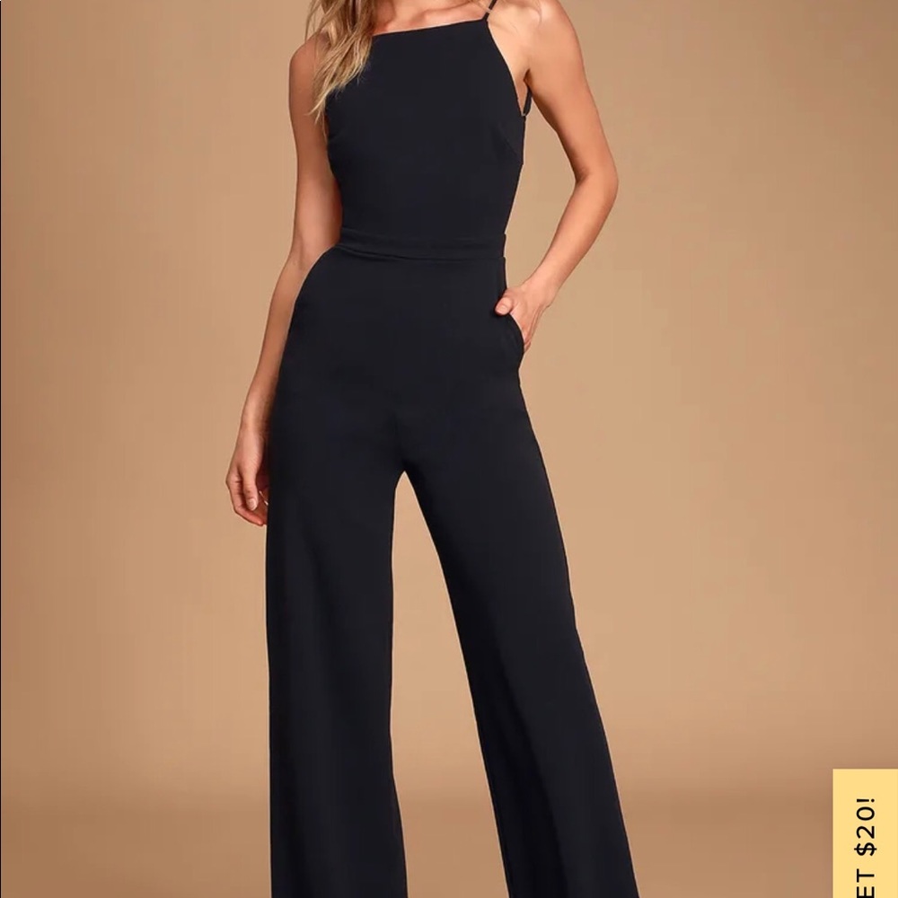 Black jumper. With tie in the back